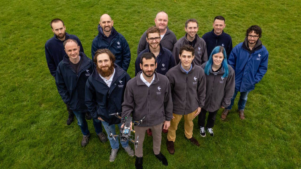 This is a photo of the Perceptual Robotics team looking up at the camera.